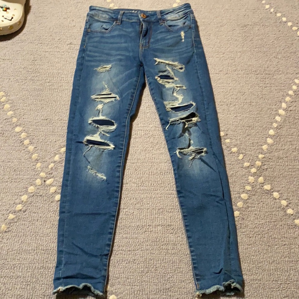 American eagle skinny jeans with some patched rips, size 4